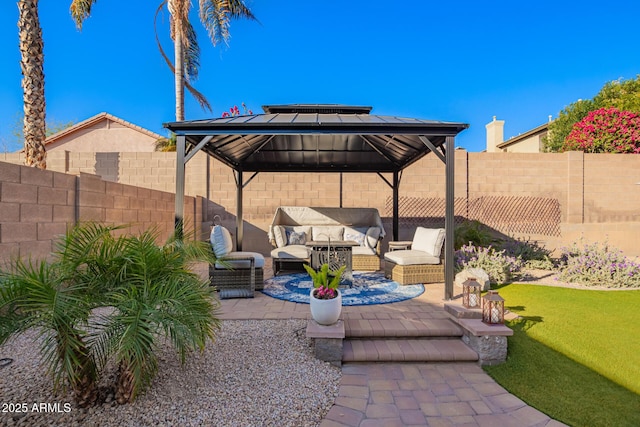 view of patio featuring a gazebo and an outdoor hangout area