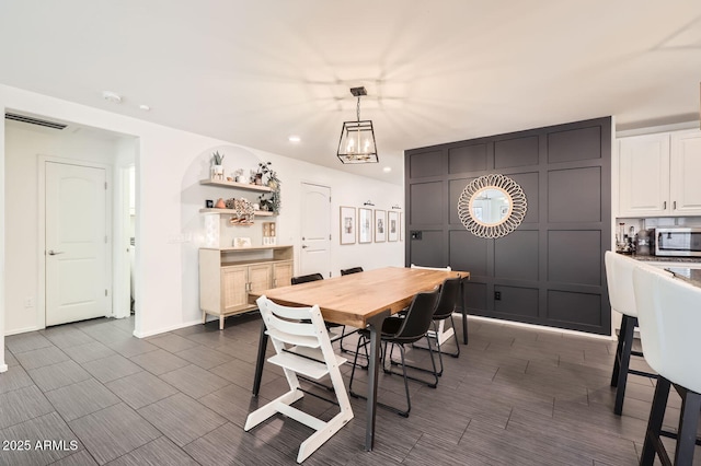128 E Bluejay Dr, Chandler, AZ 85286 - dining space with recessed lighting, baseboards, and wood tiled floors