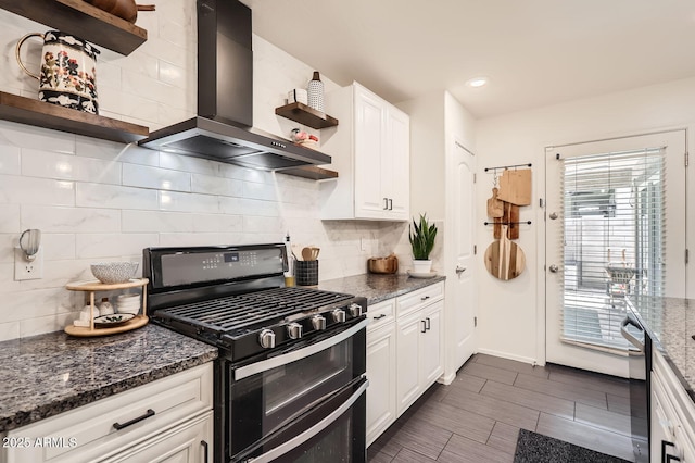 128 E Bluejay Dr, Chandler, AZ 85286 - kitchen with wall chimney exhaust hood, range with two ovens, open shelves, decorative backsplash, and recessed lighting