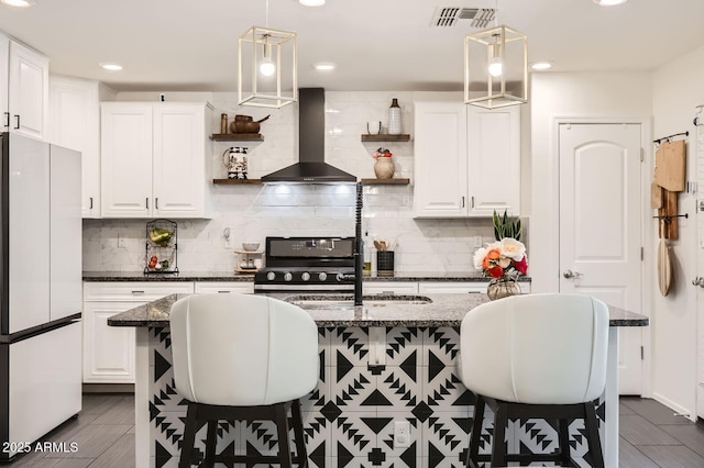 128 E Bluejay Dr, Chandler, AZ 85286 - kitchen featuring freestanding refrigerator, wall chimney exhaust hood, open shelves, electric stove, and recessed lighting