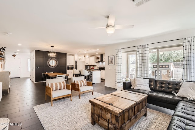 128 E Bluejay Dr, Chandler, AZ 85286 - living room with a ceiling fan and recessed lighting