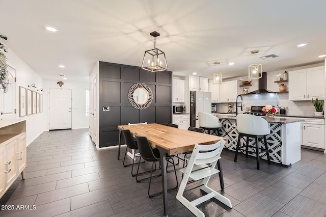 128 E Bluejay Dr, Chandler, AZ 85286 - dining space with recessed lighting, a chandelier, and baseboards