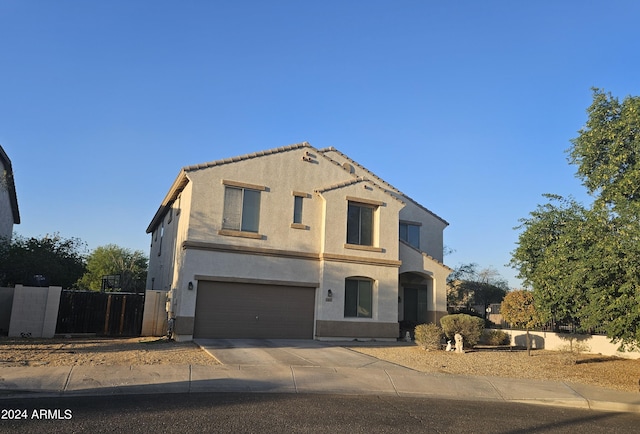 view of front of home with a garage