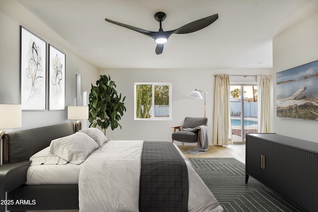 6739 E Thunderbird Rd, Scottsdale, AZ 85254 - bedroom with wood finished floors, access to outside, and ceiling fan