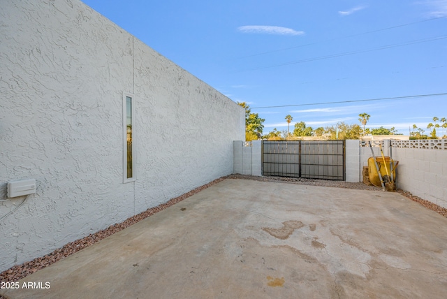 6739 E Thunderbird Rd, Scottsdale, AZ 85254 - view of patio with a gate and fence