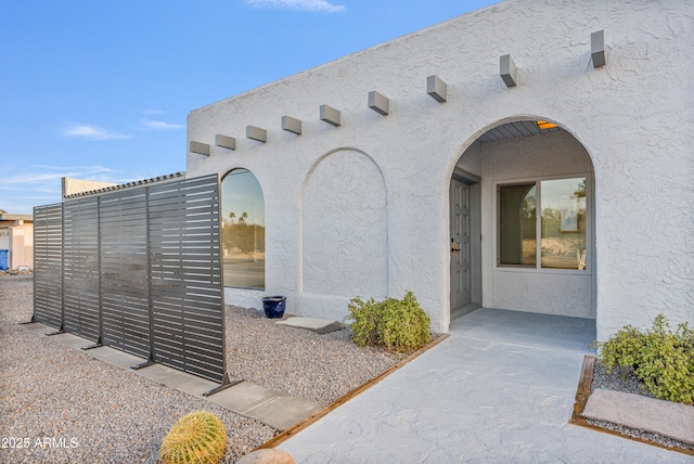 6739 E Thunderbird Rd, Scottsdale, AZ 85254 - doorway to property with stucco siding