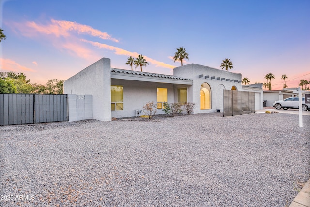 6739 E Thunderbird Rd, Scottsdale, AZ 85254 - mediterranean / spanish home with a gate, stucco siding, and a tiled roof