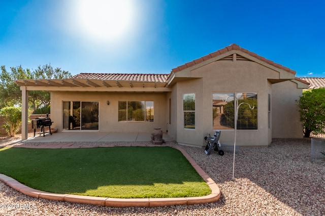 rear view of property with a patio