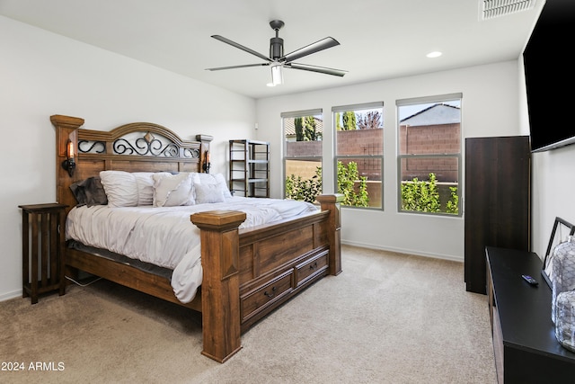 7180 W Tombstone Trl, Peoria, AZ 85383 - bedroom featuring light carpet, baseboards, ceiling fan, and recessed lighting