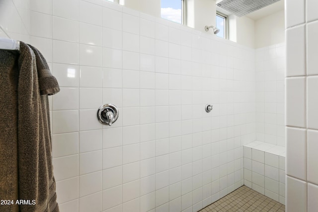 7180 W Tombstone Trl, Peoria, AZ 85383 - bathroom featuring a tile shower and tile patterned flooring