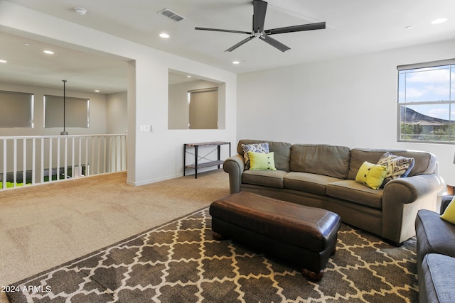 7180 W Tombstone Trl, Peoria, AZ 85383 - carpeted living room featuring a ceiling fan, recessed lighting, and baseboards