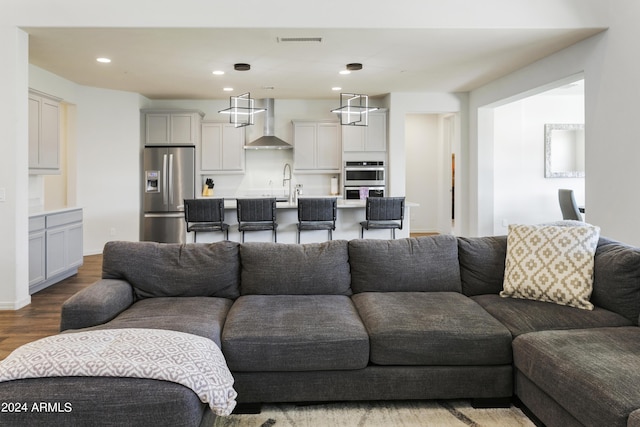7180 W Tombstone Trl, Peoria, AZ 85383 - living area with wood finished floors and recessed lighting