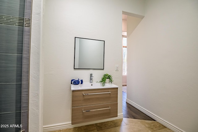 7775 E Fledgling Dr, Scottsdale, AZ 85255 - bathroom featuring vanity and baseboards