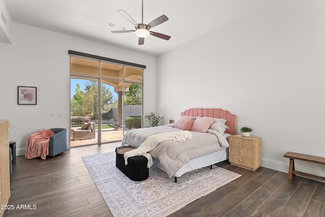 7775 E Fledgling Dr, Scottsdale, AZ 85255 - bedroom featuring access to exterior, dark wood-type flooring, and a ceiling fan