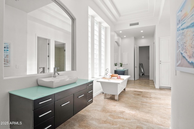 7775 E Fledgling Dr, Scottsdale, AZ 85255 - bathroom featuring vanity and a freestanding bath