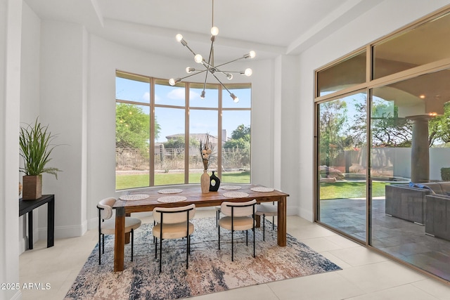 7775 E Fledgling Dr, Scottsdale, AZ 85255 - dining space with a chandelier and tile patterned floors