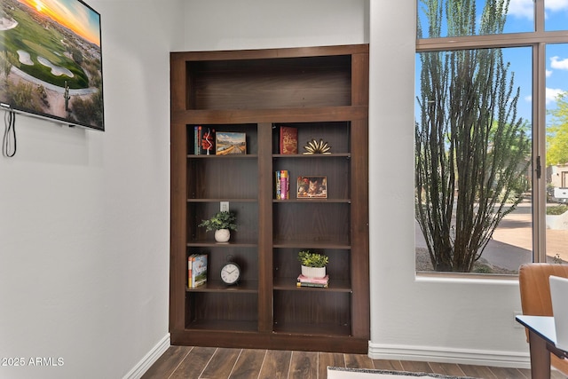 7775 E Fledgling Dr, Scottsdale, AZ 85255 - detailed view of baseboards and wood finished floors
