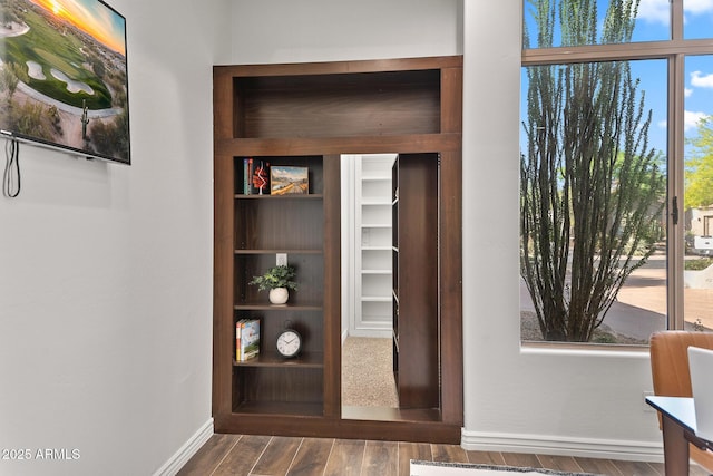 7775 E Fledgling Dr, Scottsdale, AZ 85255 - detailed view of baseboards and wood finished floors