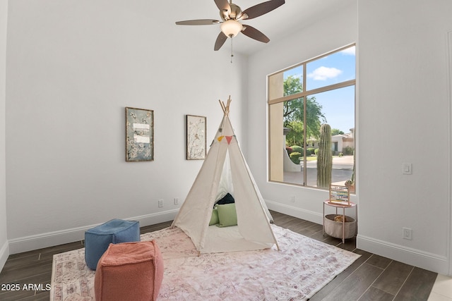 7775 E Fledgling Dr, Scottsdale, AZ 85255 - rec room featuring dark wood-style floors and a ceiling fan