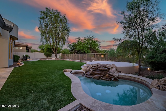 7775 E Fledgling Dr, Scottsdale, AZ 85255 - pool at dusk with a fenced backyard and a patio area
