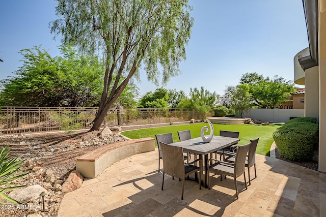 7775 E Fledgling Dr, Scottsdale, AZ 85255 - fenced backyard with outdoor dining area and a patio