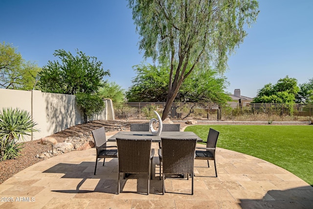 7775 E Fledgling Dr, Scottsdale, AZ 85255 - fenced backyard featuring outdoor dining area and a patio area