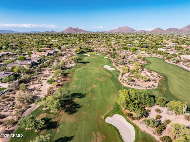 7775 E Fledgling Dr, Scottsdale, AZ 85255 - aerial overview of property's location featuring nearby suburban area, a golf course, and a mountain backdrop