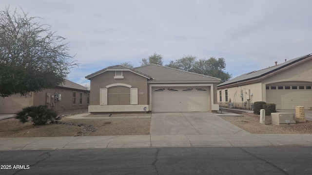 view of front of home with a garage