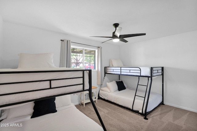 4137 E Sells Dr, Phoenix, AZ 85018 - carpeted bedroom with baseboards and ceiling fan
