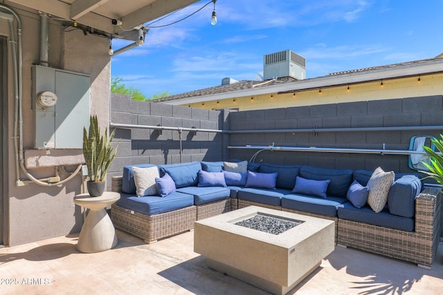 4137 E Sells Dr, Phoenix, AZ 85018 - fenced backyard featuring an outdoor living space with a fire pit, a patio area, and cooling unit