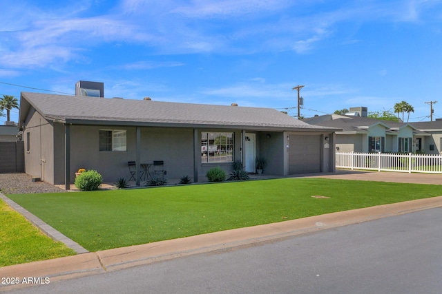 4137 E Sells Dr, Phoenix, AZ 85018 - ranch-style home with a garage, driveway, and stucco siding