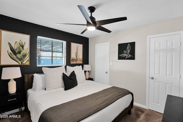 4137 E Sells Dr, Phoenix, AZ 85018 - carpeted bedroom with ceiling fan and baseboards