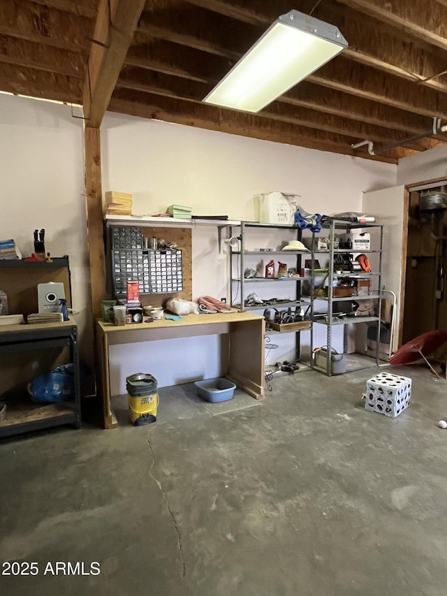 basement with a workshop area