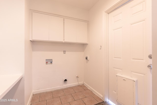 washroom featuring cabinets, light tile patterned flooring, hookup for an electric dryer, and washer hookup