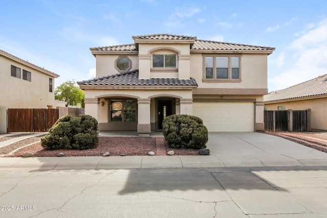 mediterranean / spanish-style house featuring a garage