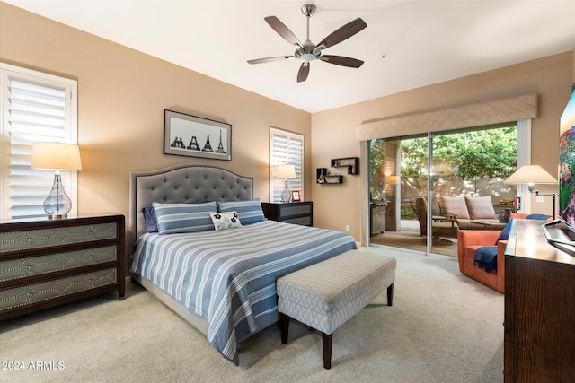 carpeted bedroom featuring access to outside and ceiling fan