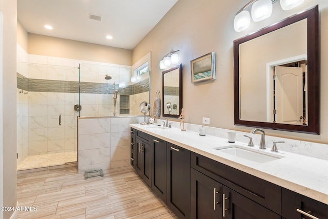 bathroom featuring vanity and walk in shower