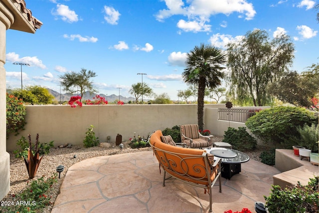 view of patio featuring a fire pit