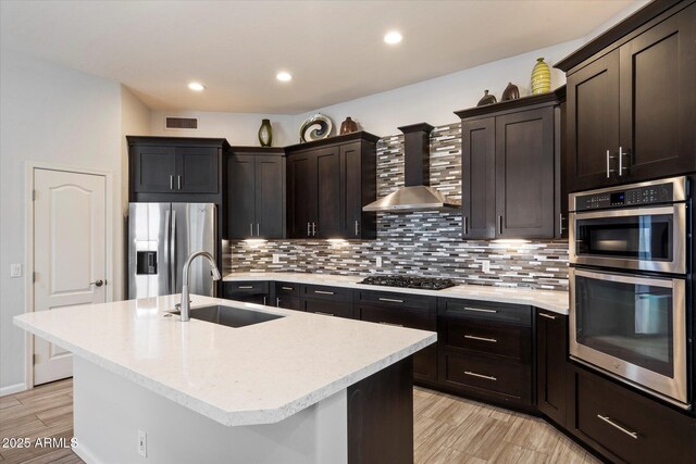 7979 E Princess Dr Unit 13, Scottsdale, AZ 85255 - kitchen featuring stainless steel appliances, healthy amount of natural light, light countertops, recessed lighting, and decorative backsplash