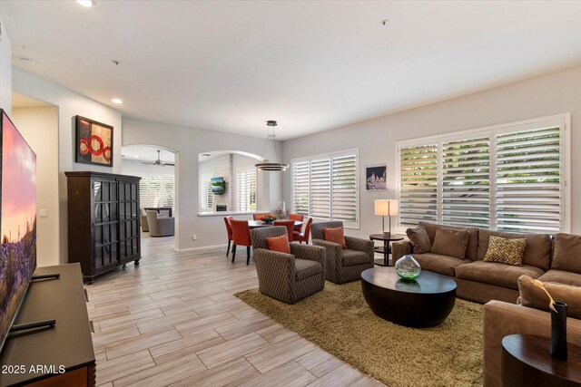 7979 E Princess Dr Unit 13, Scottsdale, AZ 85255 - living room with ceiling fan, recessed lighting, and light wood-type flooring