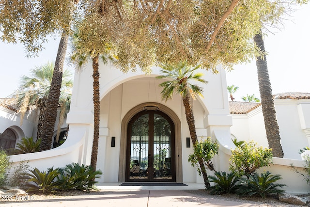 doorway to property featuring french doors