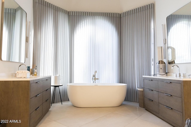 6271 E Horseshoe Rd, Paradise Valley, AZ 85253 - full bathroom with a sink, a freestanding bath, two vanities, and tile patterned flooring