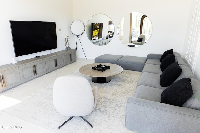 living room with light tile patterned floors