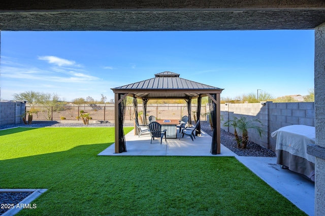 view of yard with a gazebo and a patio area