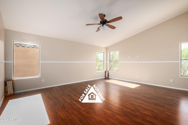 unfurnished room with ceiling fan, dark hardwood / wood-style floors, and lofted ceiling