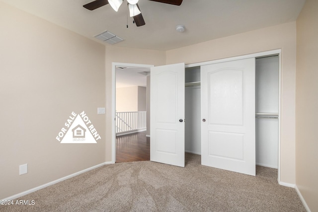 unfurnished bedroom featuring carpet flooring, a closet, and ceiling fan