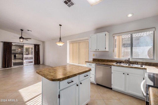 kitchen featuring dishwasher, a center island, white cabinets, sink, and ceiling fan