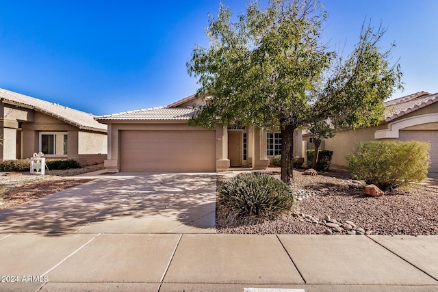 view of front of property with a garage