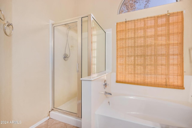 bathroom with plus walk in shower and tile patterned floors