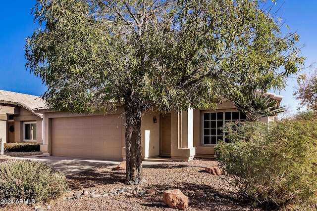 view of front of home with a garage